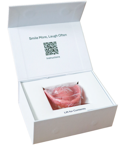 Open Easy Denture box with the denture sealed in its protective bag